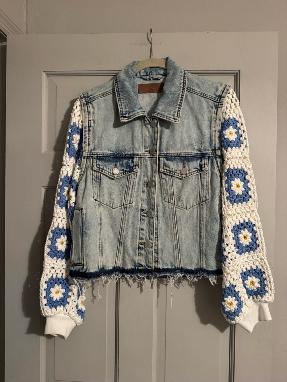 Blank NYC Light Wash Denim Jacket with Blue, White & Yellow Crochet Sleeves